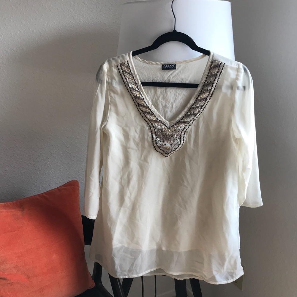 Loose cream blouse